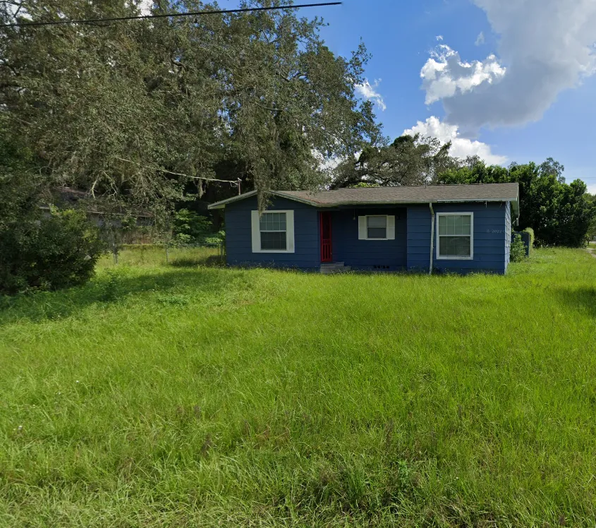 Home exterior before renovation with original design