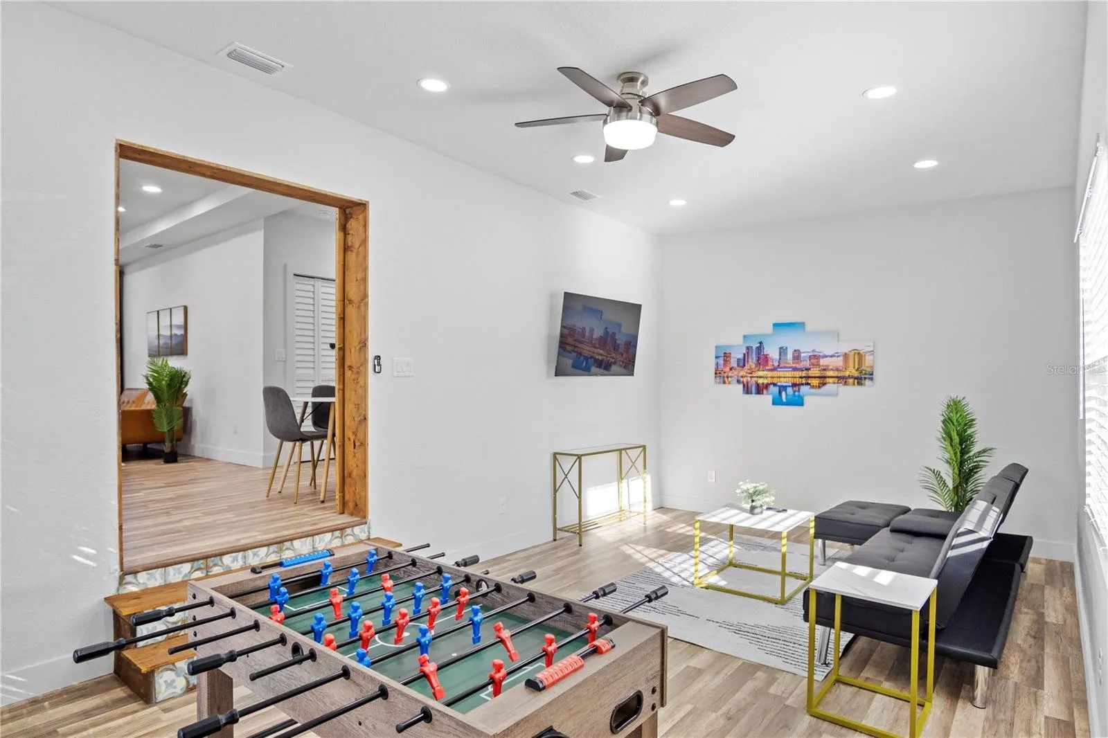 Entertainment room with space for gaming and relaxation